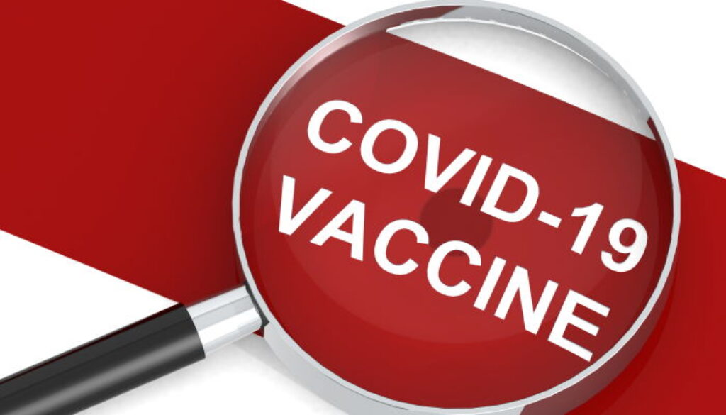 Covid-19 vaccine word under magnifying glass, 3d rendering