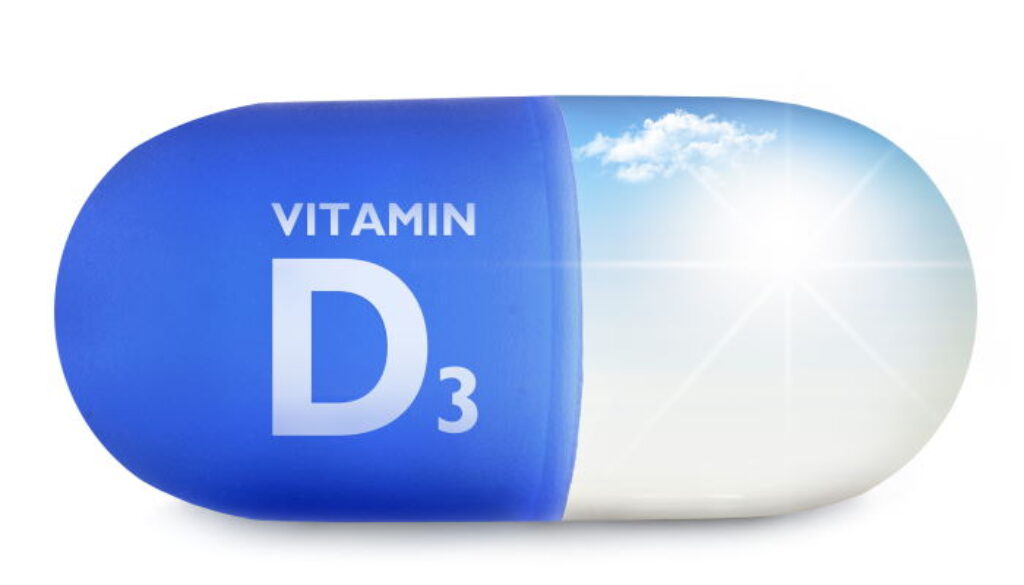 Close up of a vitamin pill with vitamin d sunshine inside