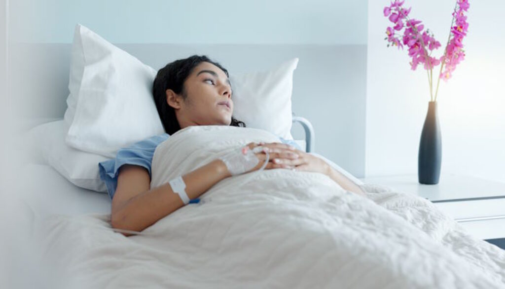 Hospital bed, woman and stress with thinking about medical support and surgery at a clinic. Anxiety, sad and tired female patient with recovery and healthcare treatment in a ICU room of sick person